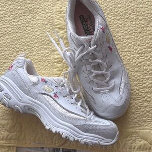 Skechers Women's White Sneakers with Pink Accents